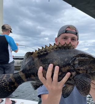 Explore diverse fishing hotspots. A Grouper fish!